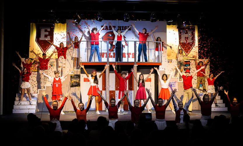 Students in the Page Middle musical pose in the finale